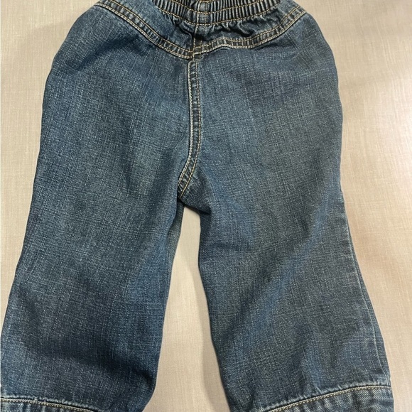 GYMBOREE “Bow Puppy and Cat” blue jeans with red and cheetah bows. 12-18 months - Picture 2 of 6